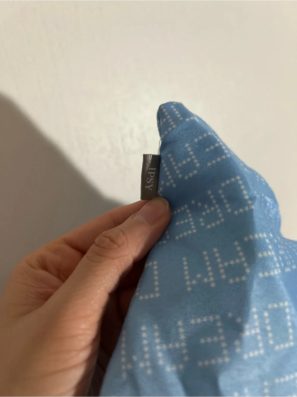 Light Blue Drawstring Pouch with 'DREAM' Pattern